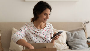 A customer is checking out the product information via the keyword campaign on the product packaging.