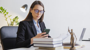 Government employee texting citizens using her mobile phone. 